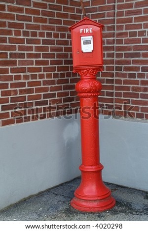 Fire alarm box and transmitter on pedestal