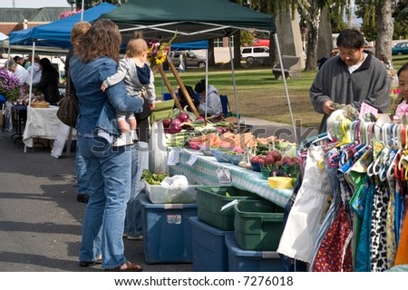 Purchase being made at Farmer\'s Market