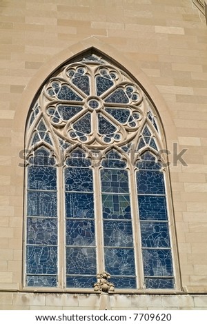 Stained-glass window and Gothic architecture in a beautiful, old cathedral