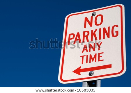 No parking sign against a blue sky