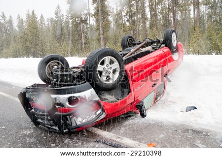WEST YELLOWSTONE, MT - APRIL 13: 2007 Dodge Ram 1500 flipped and rolled after hitting a patch of ice April 13, 2009 near West Yellowstone, MT. The driver was wearing a seat belt and was not injured.