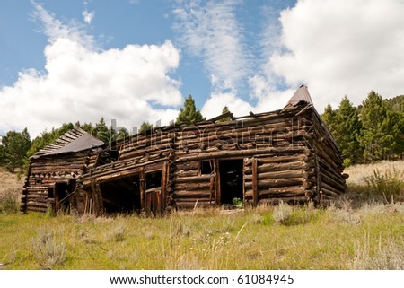 This beautiful log building, the livery, is scheduled to be torn down if it doesn\'t fall down first