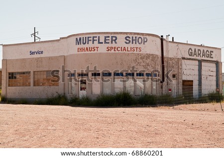 Out of business, in need of repairs, muffler shop on Route 66 is for sale