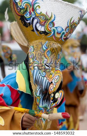 LOEI ,THAILAND-JUNE 24: Ghost Festival (Phi Ta Khon) is a type of masked procession celebrated on Buddhist merit- making holiday known in Thai as\