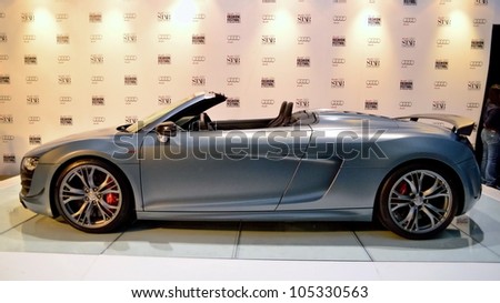 SINGAPORE - MAY 18: Side profile of Audi R8 GT Spyder on display at Audi Fashion Festival 2012 on May 18, 2012 in Singapore