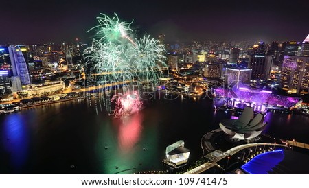 SINGAPORE - AUGUST 4: Aerial view of fireworks display from Marina Bay Sands during National Day Parade Singapore 2012 Preview on August 4, 2012 in Singapore.