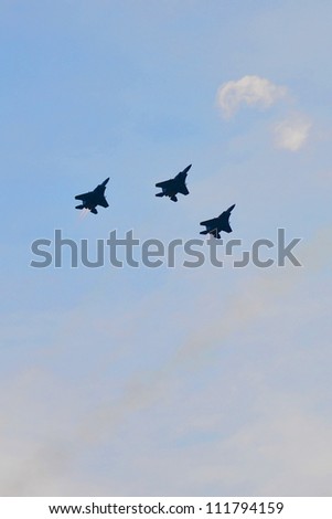 SINGAPORE - AUGUST 09: Republic of Singapore Air Force F-16 flypast during National Day Parade 2012 on August 09, 2012 in Singapore