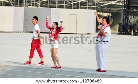 SINGAPORE - AUGUST 9: Hosts perform during National Day Parade Singapore 2012 on August 9, 2012 in Singapore.
