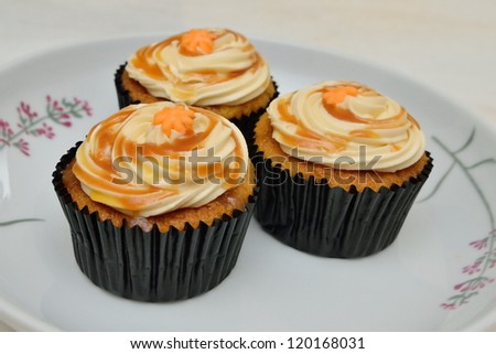 A plate of salted caramel cupcakes