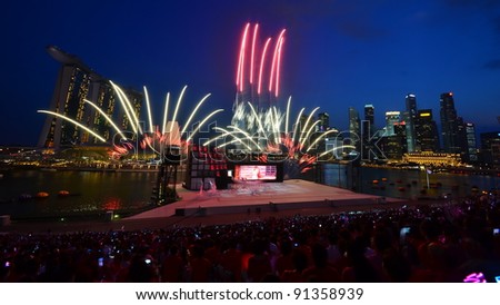 SINGAPORE - AUGUST 9: Fireworks display during National Day Parade Singapore 2011 on August 9, 2011 in Singapore.
