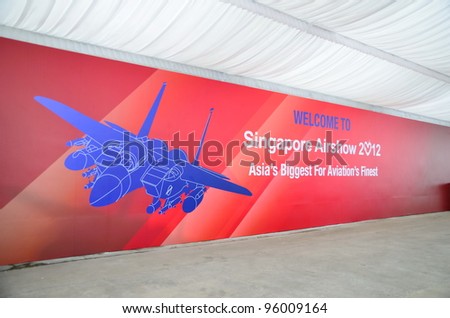 SINGAPORE - FEBRUARY 12: A huge welcome board at the entrance at Singapore Airshow February 12, 2012 in Singapore