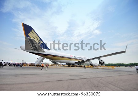 SINGAPORE - FEBRUARY 17: Back of Singapore Airlines (SIA) last Boeing 747-400 aircraft at Singapore Airshow on February 17, 2012 in Singapore