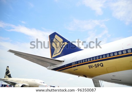 SINGAPORE - FEBRUARY 17: Singapore Airlines\' (SIA) Boeing 747-400 tailplane at Singapore Airshow on February 17, 2012 in Singapore