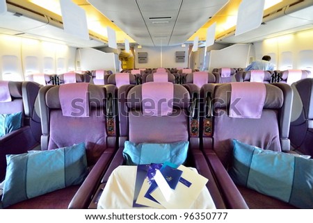 SINGAPORE - FEBRUARY 17: Front view of spacious business class seats in Singapore Airlines' (SIA) last Boeing 747-400 aircraft at Singapore Airshow on February 17, 2012 in Singapore
