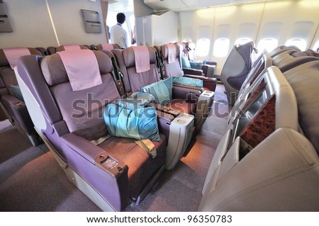 SINGAPORE - FEBRUARY 17: Business class cabin in Singapore Airlines\' (SIA) last Boeing 747-400 aircraft at Singapore Airshow on February 17, 2012 in Singapore