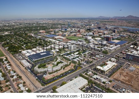 Aerial view of the City of Tempe with college campus skyline