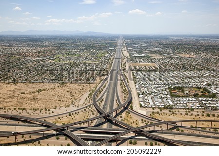 Looking West from the Loop 202 Red Mountain and U.S. 60 Superstition freeway interchange in Mesa towards Tempe and Phoenix, Arizona