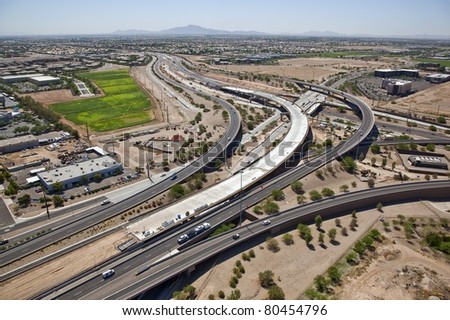Aerial view of the Loop 101 and Loop 202 freeway bridge under construction