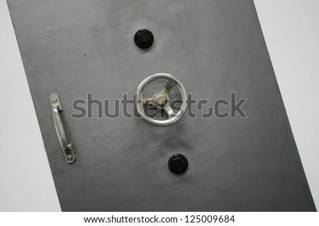 close up on closed bank vault close up on closed solid old bank vault door with combination lockdoor