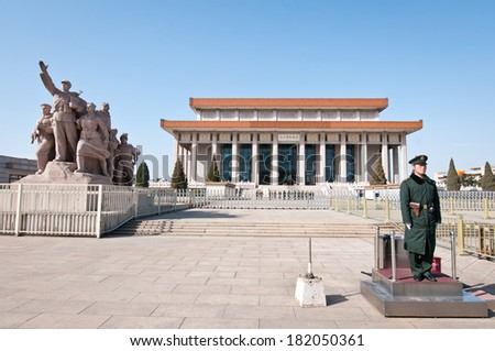 BEIJING - MARCH 27: Chinese soldier stands on attention in front of Mausoleum of Mao Zedong at Tiananmen Square on March 27, 2013 in Beijing