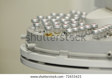 Chemistry lab - small vials in Gas Chromatograph autosampler