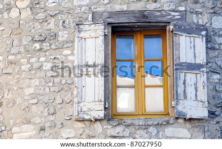 Windows on old stone tenement house in Sault, Vaucluse department, Provence region in France