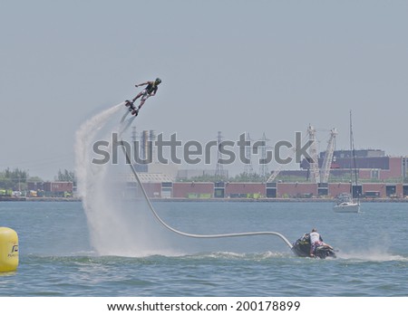 Toronto, Canada - June 22, 2014 : The world\'s newest extreme water sport call flyboarding at the 2014 Flyboard North American Championships happening at Harbour Square Park.