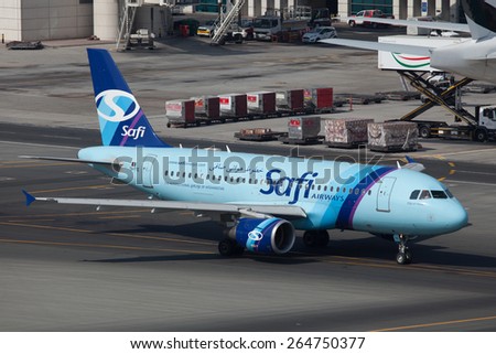 DUBAI - NOVEMBER 3: Safi Airways A319 new addition to its fleet is seen here taxing to the gate after arrival in Dubai International Airport as soon on November 3, 2013. Safi is Afghanistan airlines.