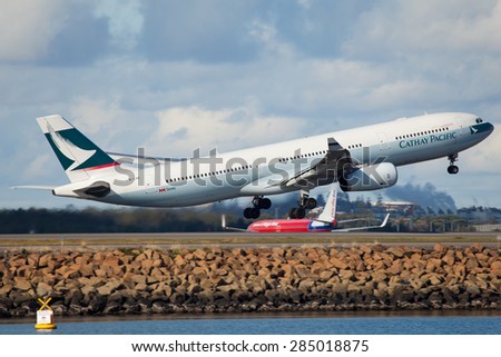 SYDNEY - JULY 11: A Cathay Pacific Airline A330 is seen here in Sydney airport taking off as seen on July 11, 2013.