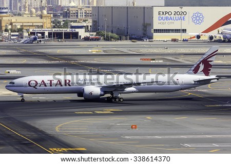 DUBAI - OCTOBER 29: A Qatar airways, B777 plane is taxiing to the gate after her arrival from Qatar, Doha at the Dubai International Airport as seen on October 29, 2015.