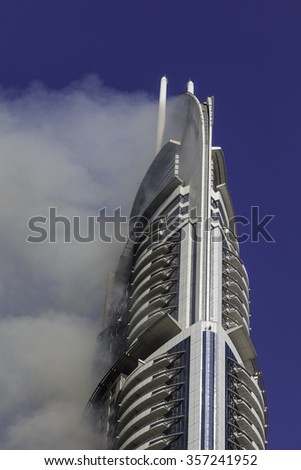 DUBAI - JANUARY 1: The address hotel caught fire on the new years eve. This is the aftermath the next day which still shows the hotel is on fire as seen on January 1, 2016.