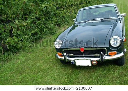 stock photo A 1972 MGBGT finished in British Racing Green sits