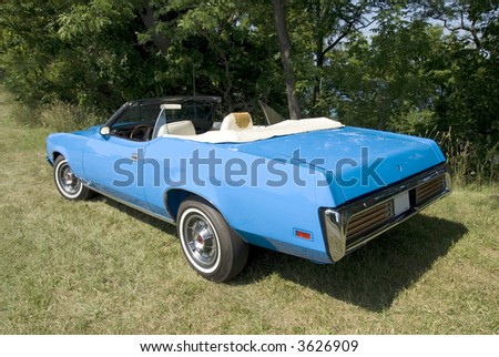 stock photo An immaculate blue 1971 Mercury Cougar convertible