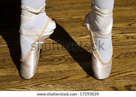 Ballet pointe shoes shot on a sunny day.