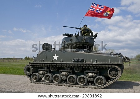 A World War Two Mark IV Sherman tank flying the Canadian flag.