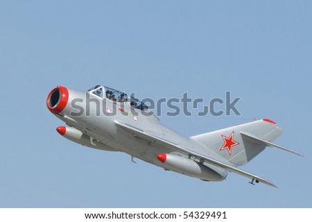 A Mikoyan-Gurevich MiG-15 two-seater jet fighter with Soviet markings. The MiG-15 was developed for the USSR  by Artem Mikoyan and Mikhail Gurevich.