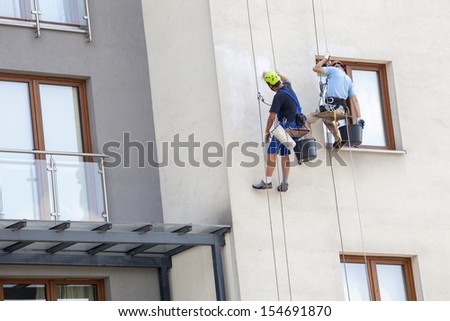 Building maintenance: Men working at height