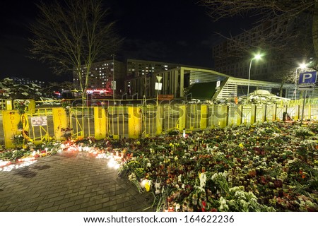 Riga, Latvia - 25 November 2013: Third day of National Mourning in Baltic Countries after roof of Maxima supermarket in Riga, Latvia unexpectedly collapsed killing 51 people.