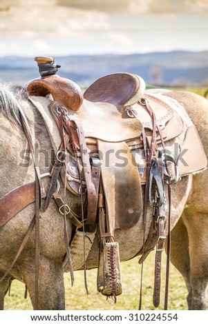 Horse saddle on the American ranch