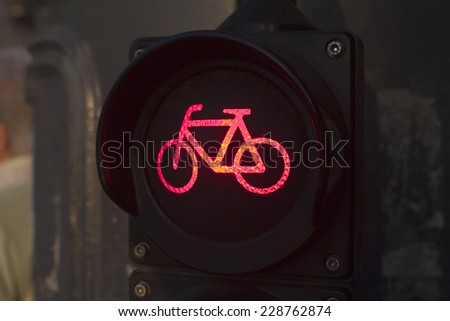 Red light for bicycle lane on a traffic light. Bicycle sign in the city