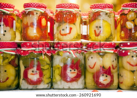 Funny jars of pickled vegetables on city market Budapest Hungary