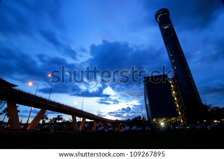 Airport control tower with express way in the evening sky
