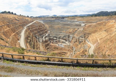 Surface mining of gold in an open pit mine in Waihi, New Zealand
