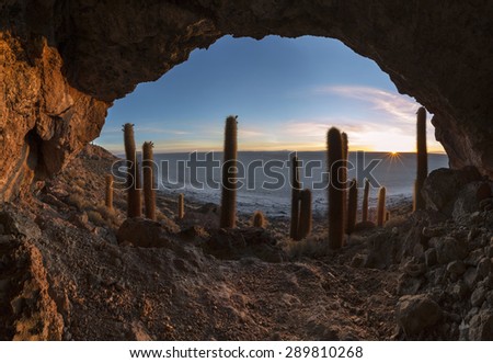 Cave on the Cactus island in Uyuni Salt desert at sunrise, Bolivia