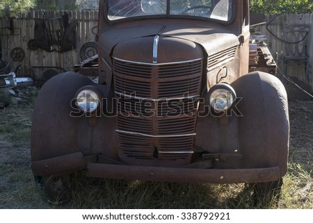 MAGDALENA - SEPTEMBER 21: residents placed old cars and trucks in the yards and in front of houses to attract tourists, September 21, 2015 at Magdalena, NM.