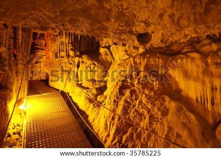 Magic Landscape of the underground cave shined by color projectors