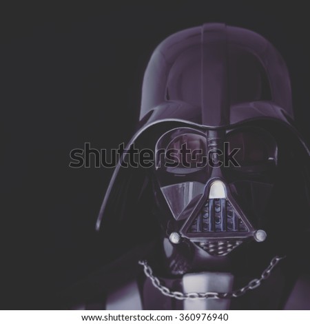 BLOOMFIELD NJ: JAN 10, 2016: Toned Portrait of Darth Vader mask and helmet on a black background.  Darth Vader is a Sith Lord also known as Anakin Skywalker, and is father to Luke Skywalker