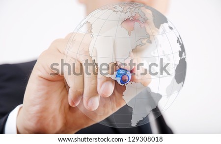 Businessman Drawing World Map Globe for Business and Technology Concept.