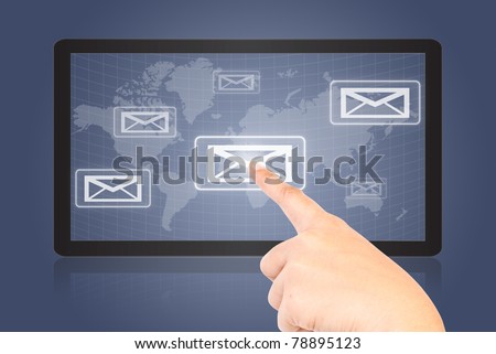 Hand pressing mail world wide on the tablet.