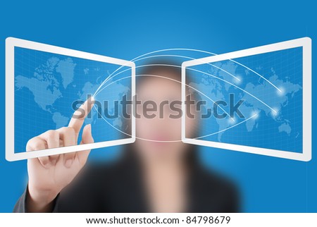 Asian businessman pushing social network world map on tablet screen.